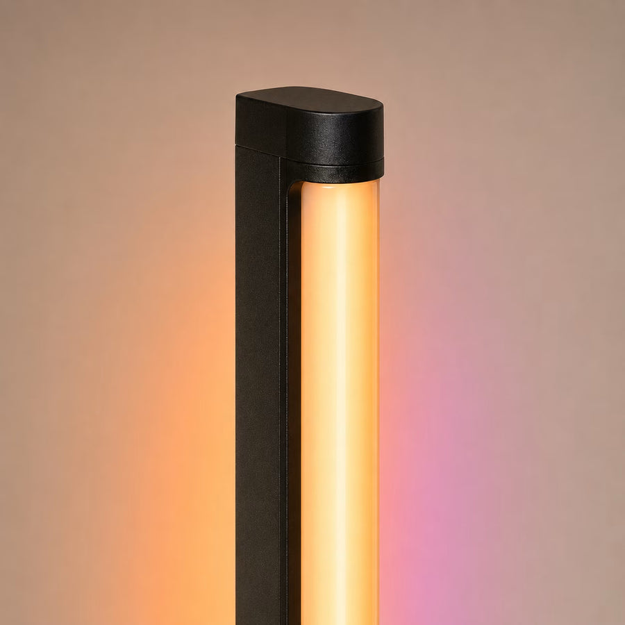 Ambient RGB Corner Floor Lamp casting coloured light into a room corner