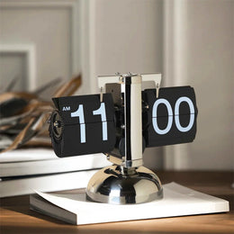 Vintage Auto Flip Clock with chrome frame and black number flaps
