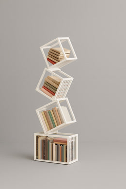Tall white Rotating Cube Bookshelf in a modern interior