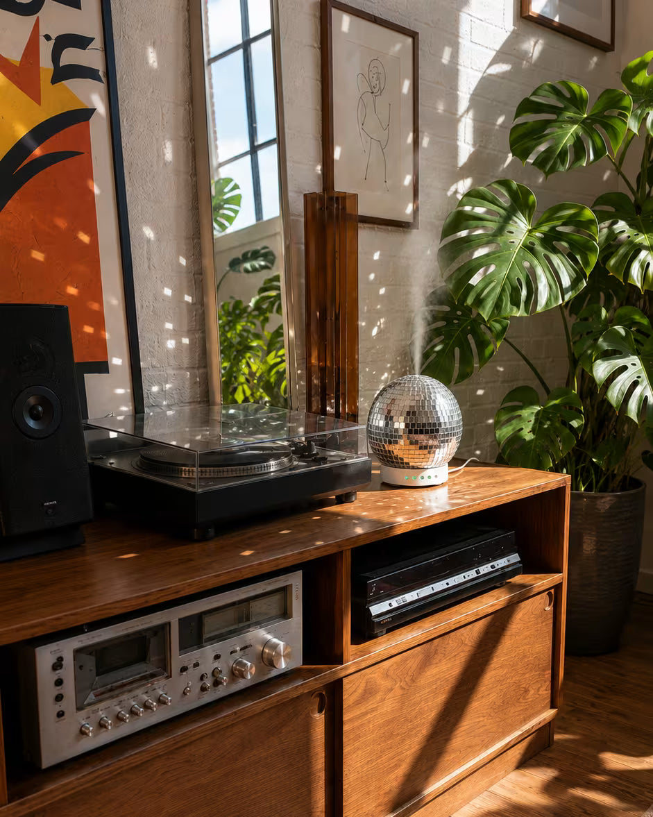Compact Disco Ball Diffuser styled on a wooden sideboard