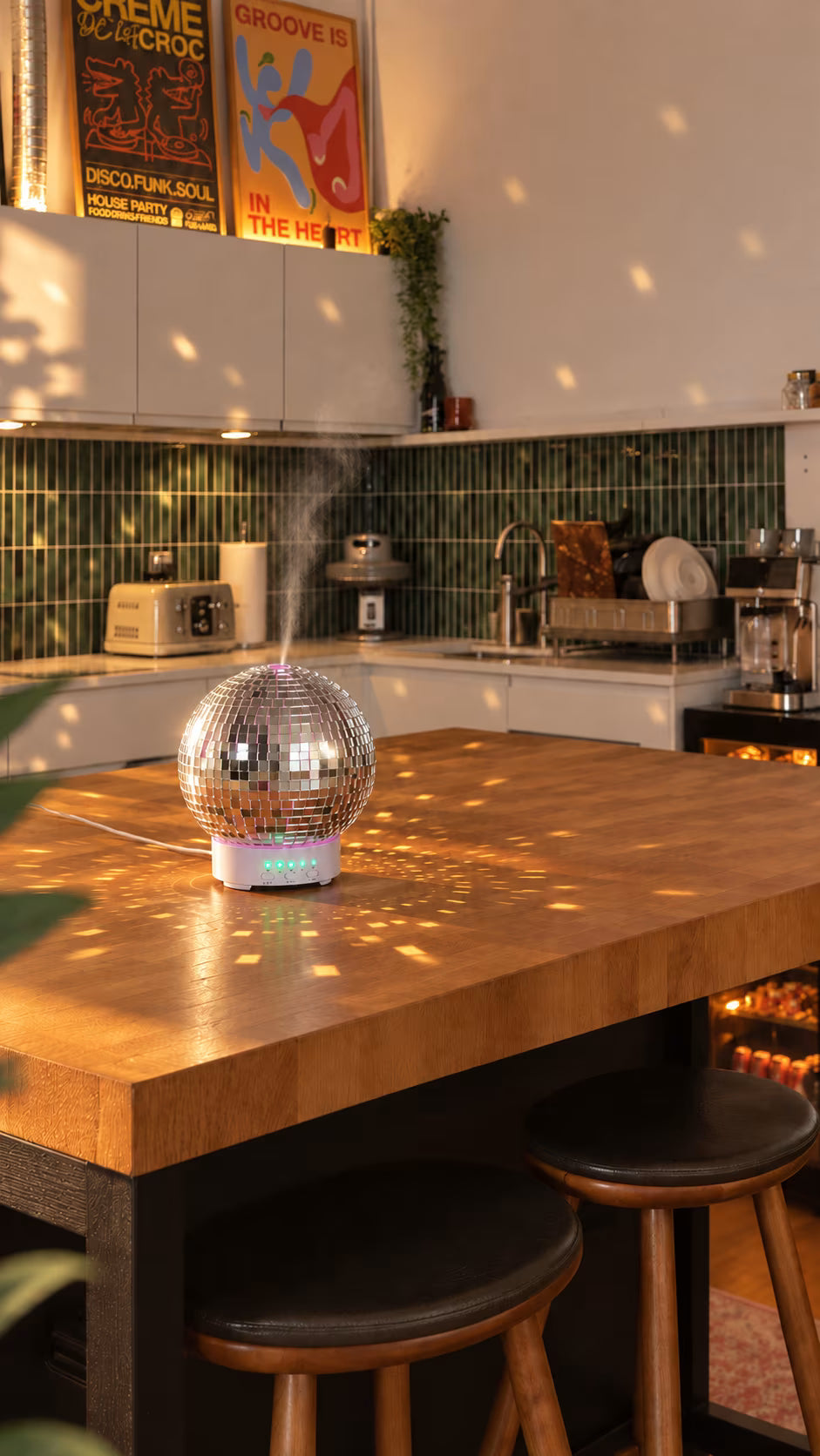 Silver rotating disco ball aroma diffuser