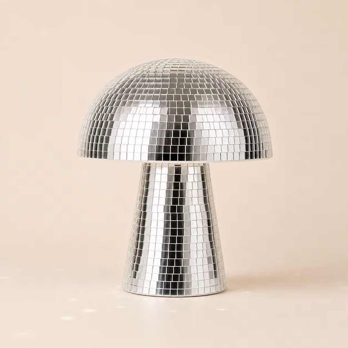 Small and large Disco Mushroom sculptures displayed together