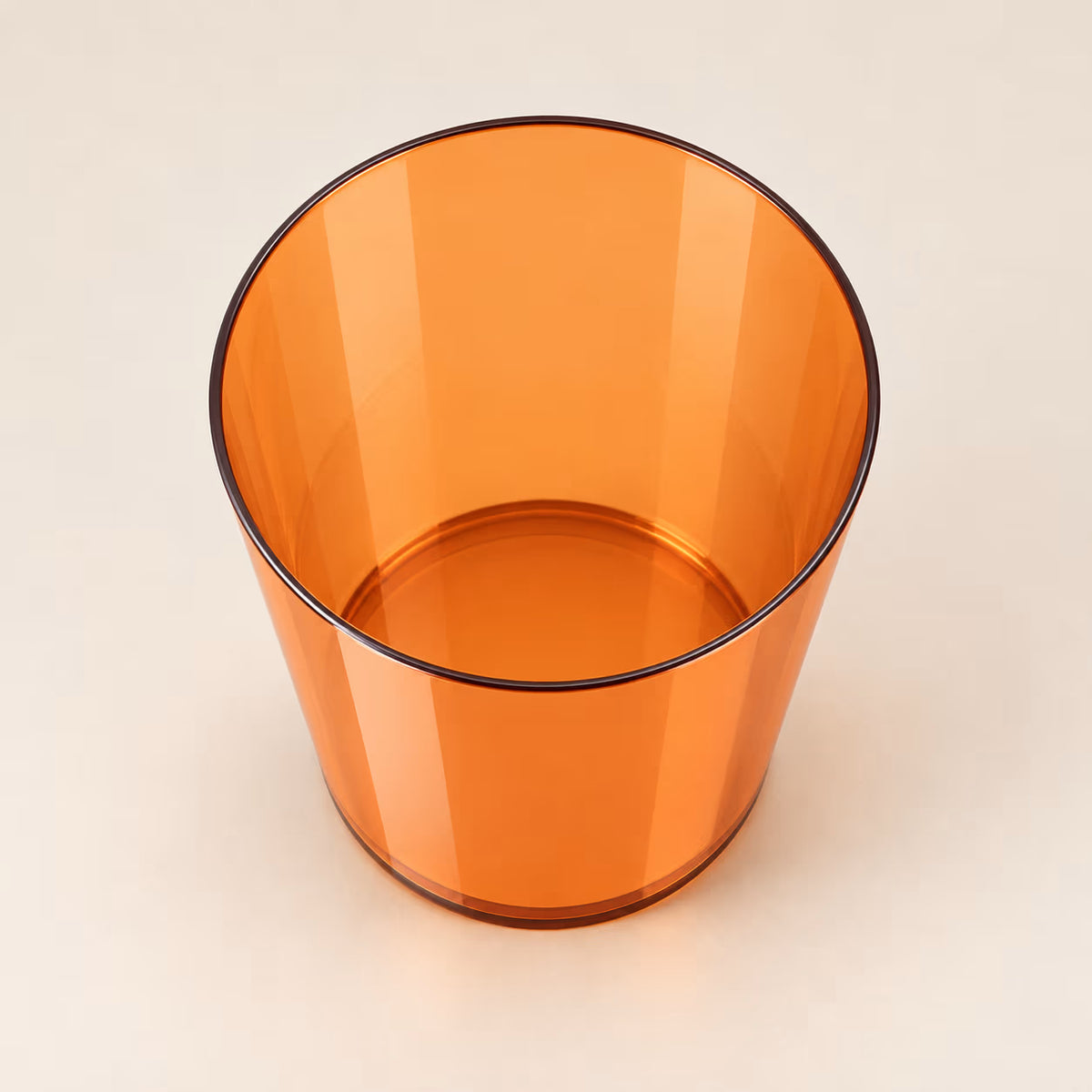 Orange translucent waste bin, second alternate view