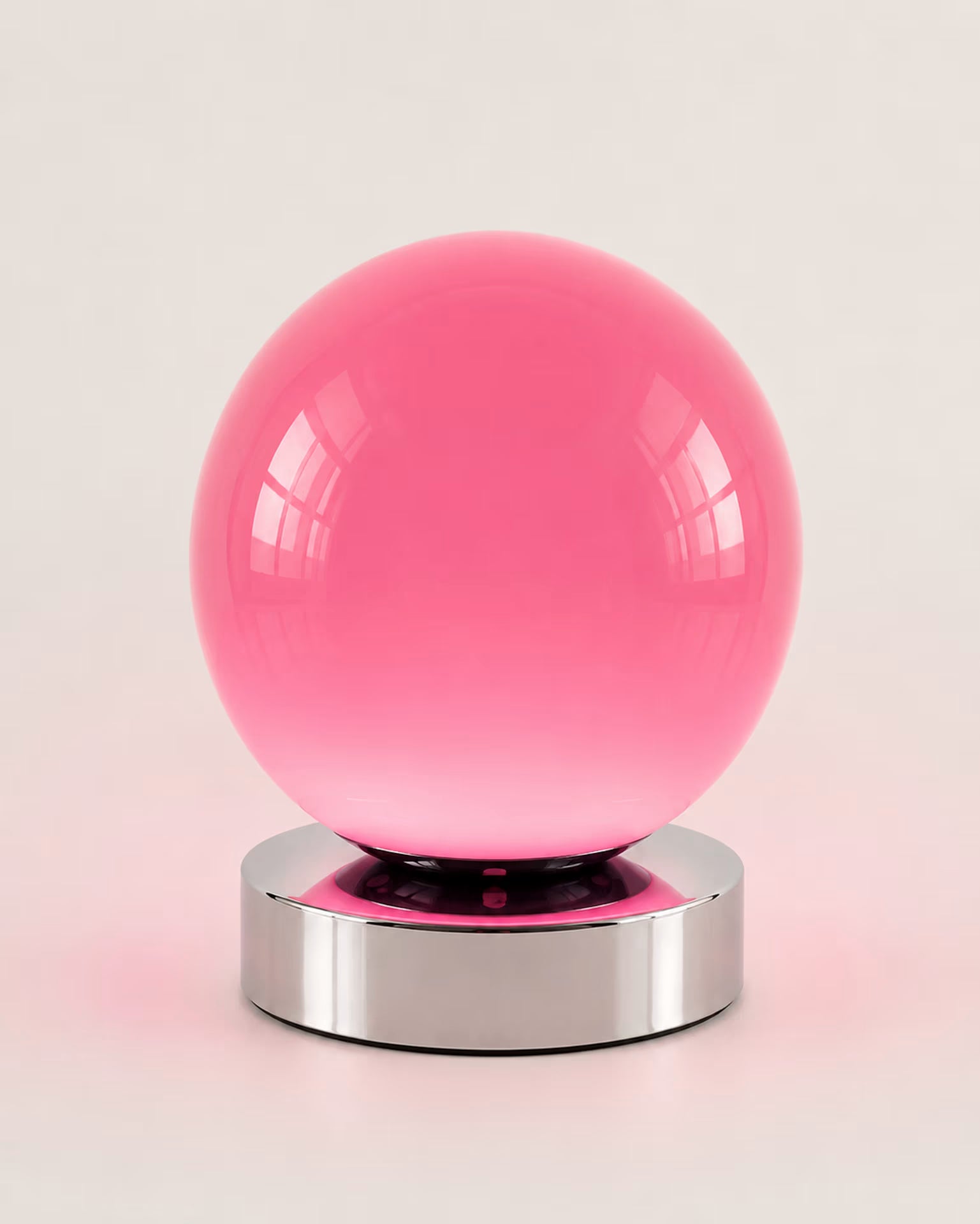 Low-profile pink globe bedside lamp with nine brightness levels