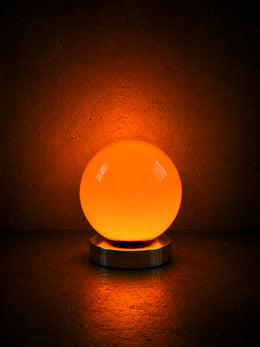 Orange Nova Flare USB table lamp with integrated LED