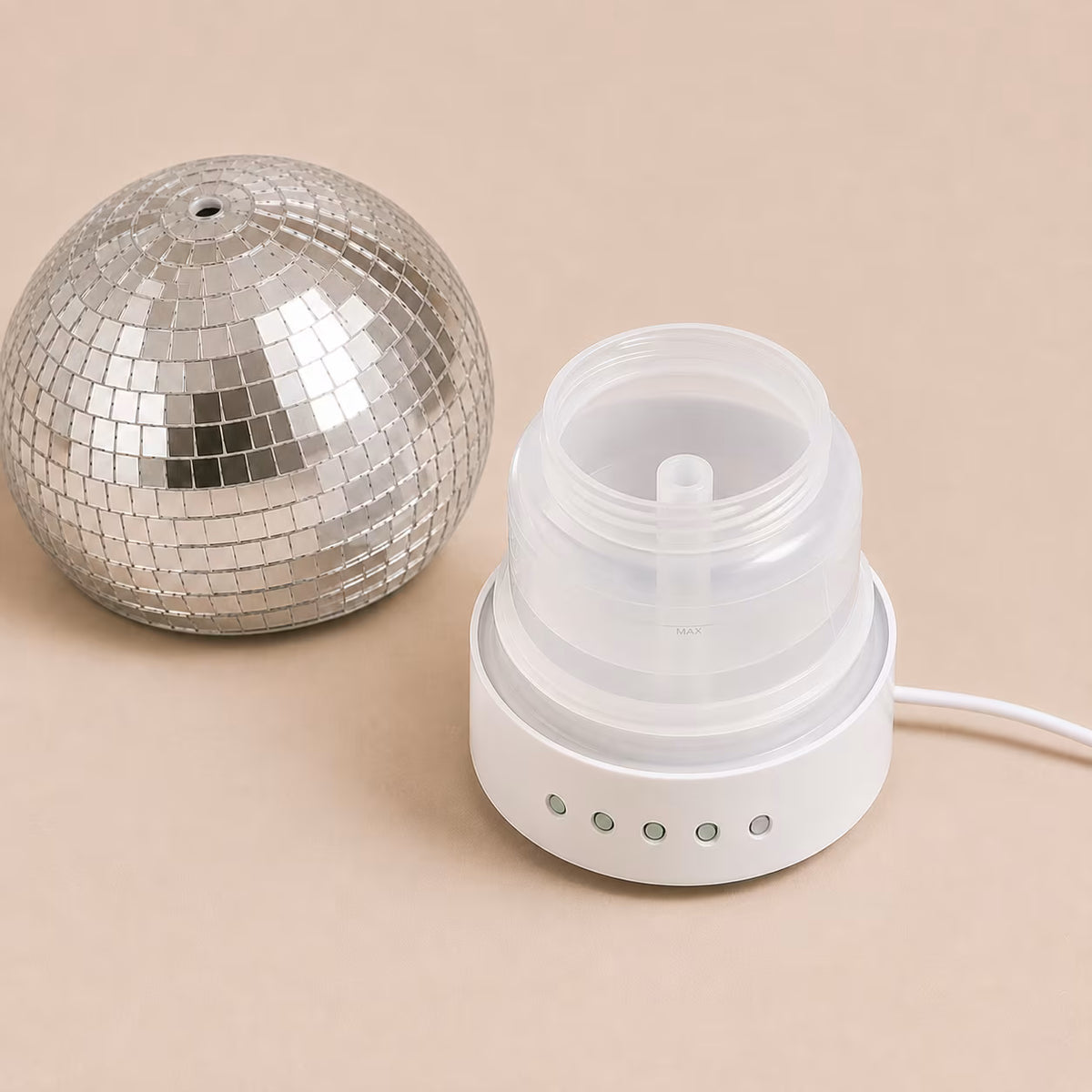 Rotating Disco Ball Diffuser front controls and mirrored finish