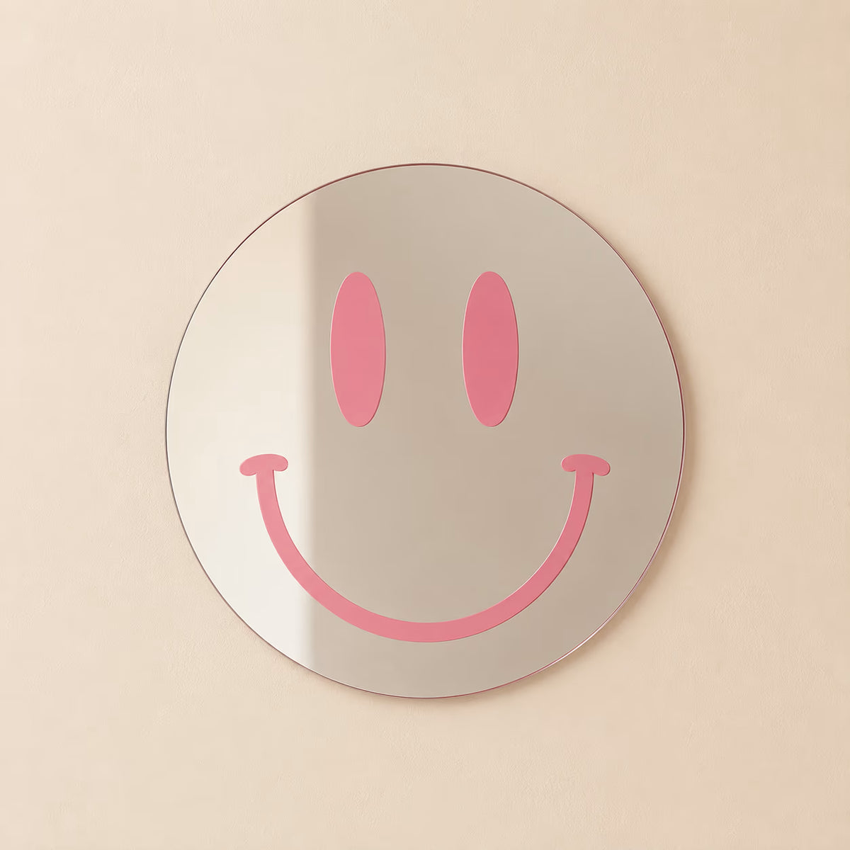 Pink Smiling Reflections acrylic mirror on a neutral wall