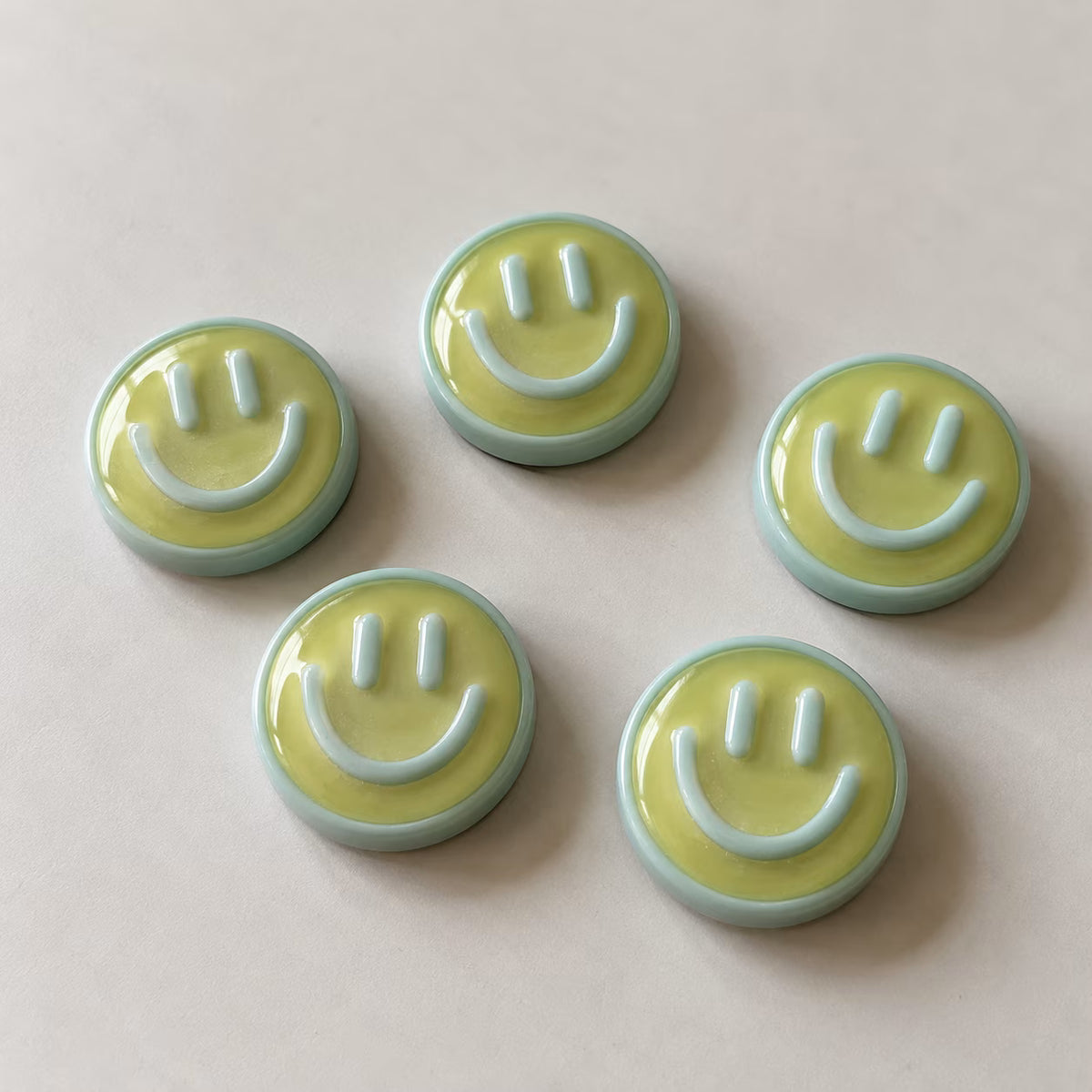 Light green smiley face fridge magnets, pack of 5