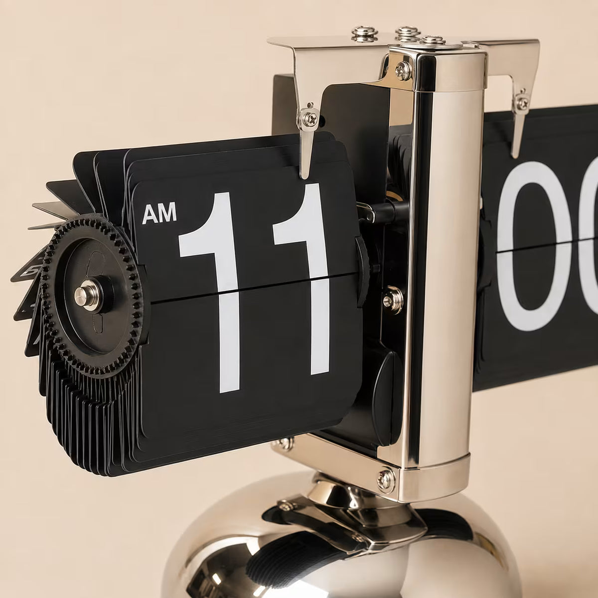 Angled view of the chrome flip clock and exposed mechanical display