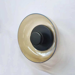 Rounded glass wall lamp with soft indoor accent light