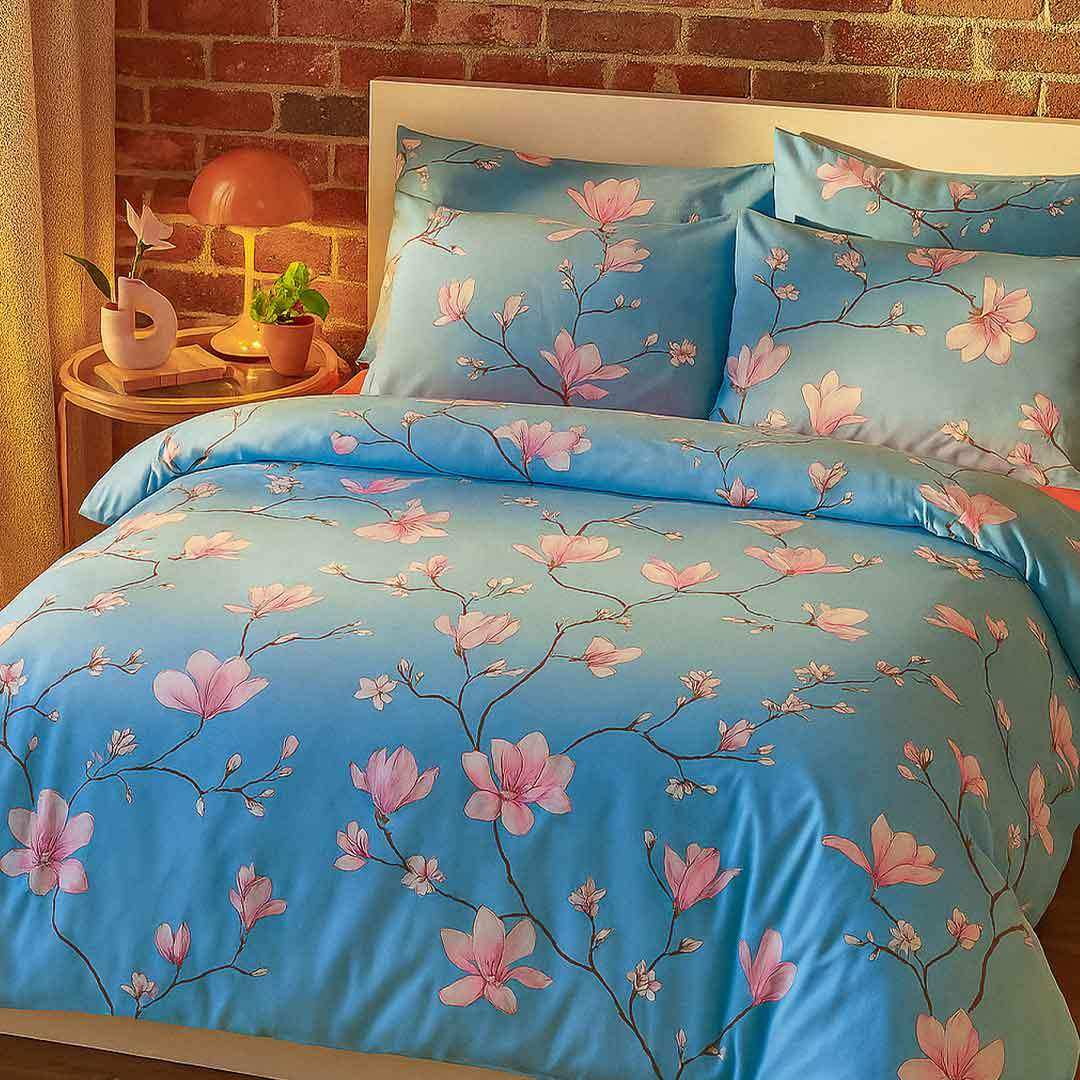Blue cherry blossom bedding set with pink floral pattern