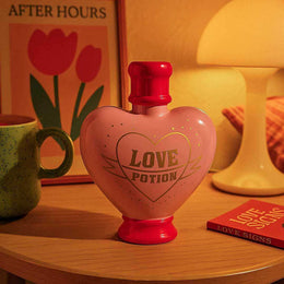Pink Love Potion heart vase and ceramic sculpture