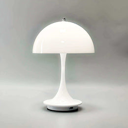 The Luna rechargeable mushroom lamp in orange