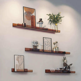 Orange acrylic wall shelf with decorative objects