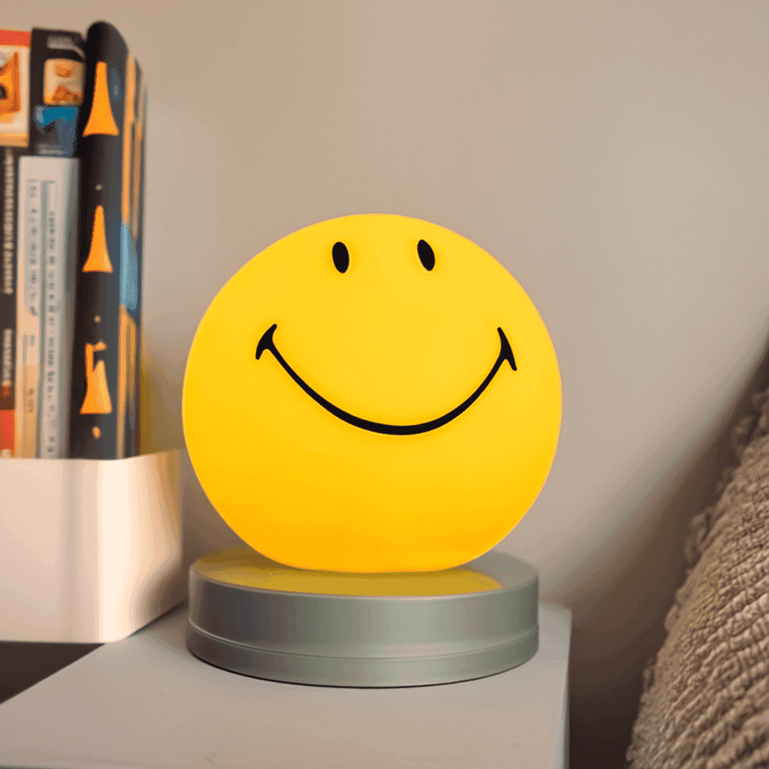 Smiley face night light with soft integrated LED glow