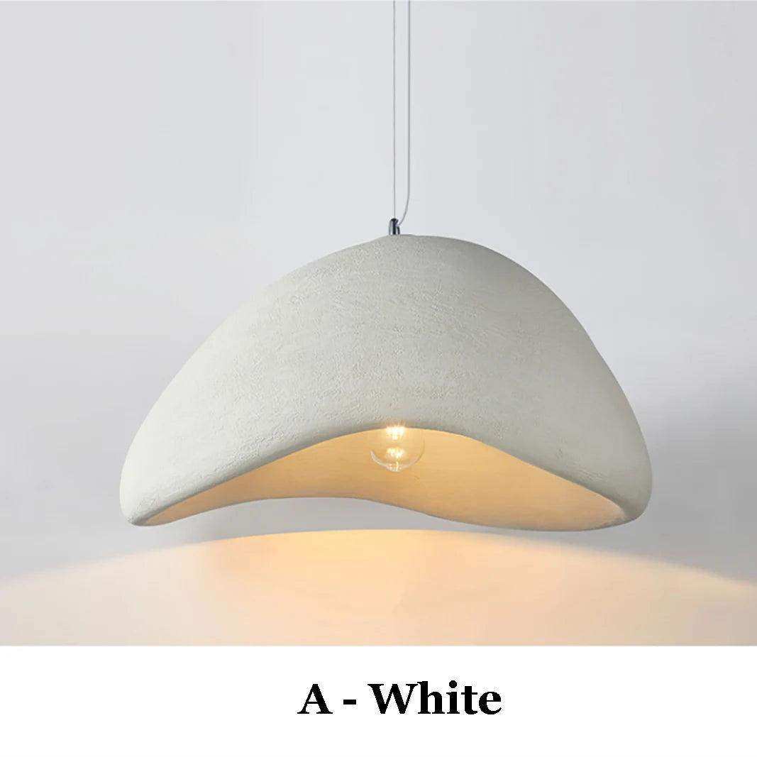 Wabi-sabi pendant light above a dining table
