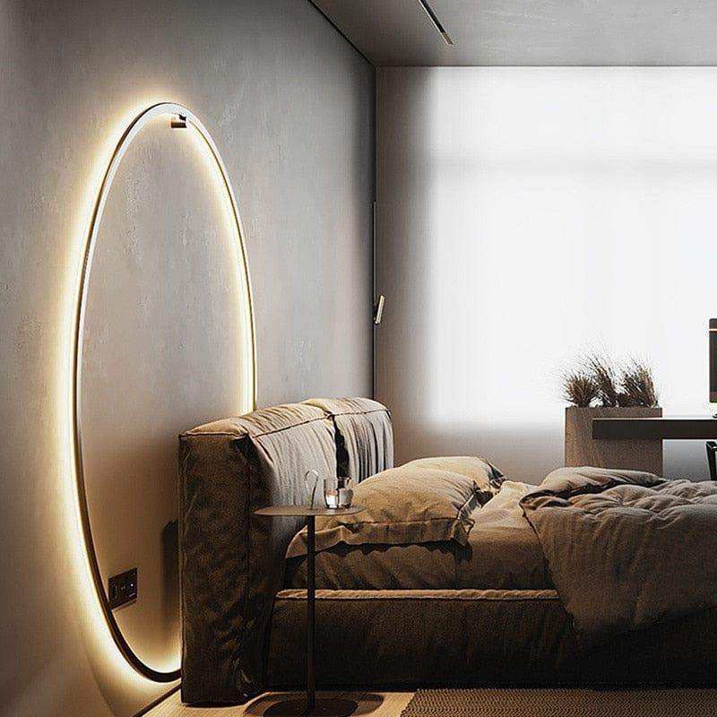 Minimalist LED ring wall light displayed in a modern interior
