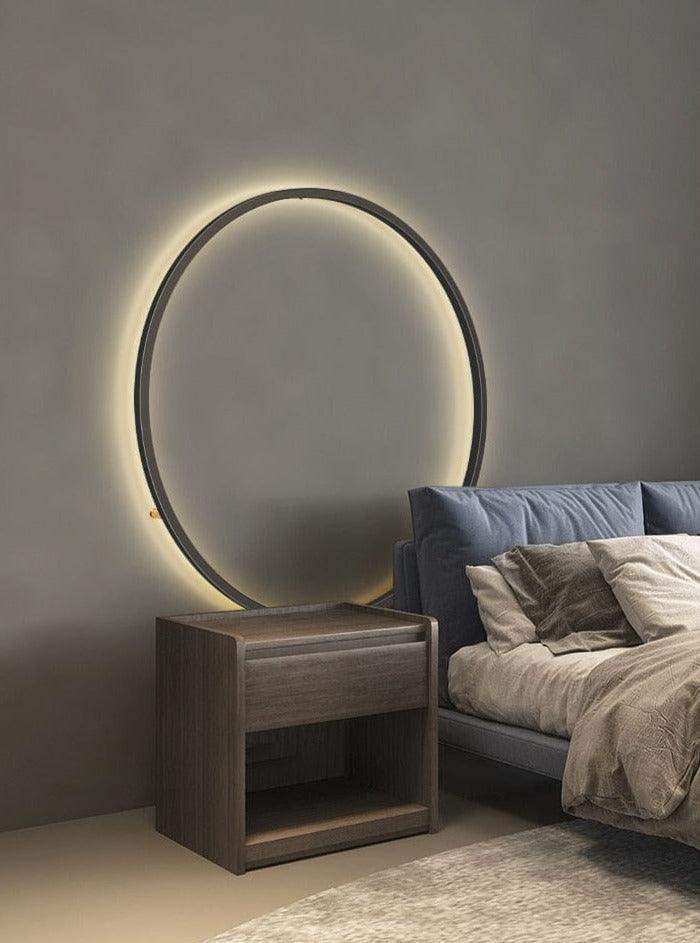 Large minimalist LED ring wall light in a contemporary room