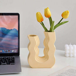 Lightweight ceramic Wavy Wonder Vase on display